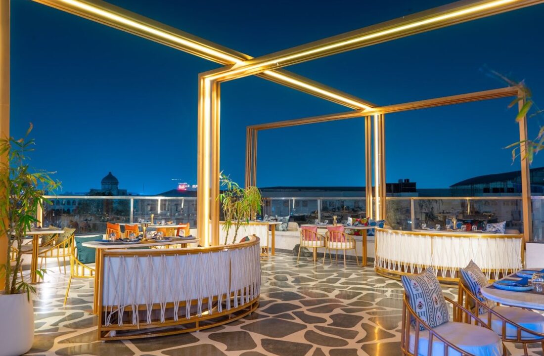 Rooftop terrace at dusk at nouba jaipur