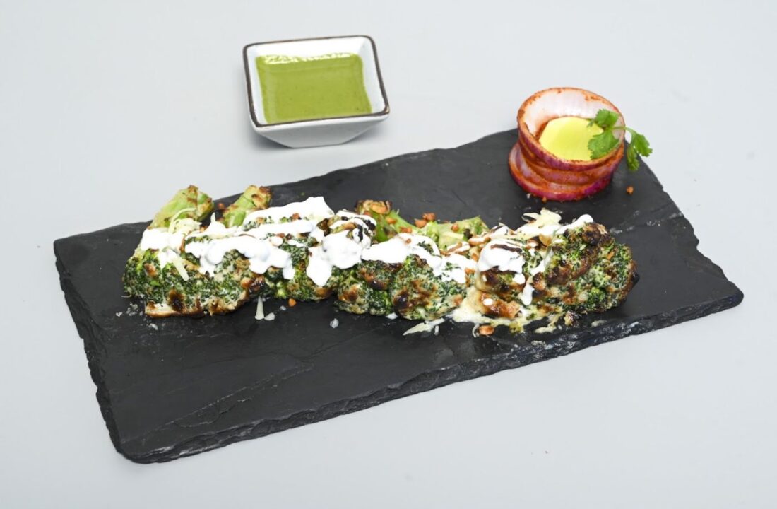Hariyali kebab served on slate at nouba jaipur