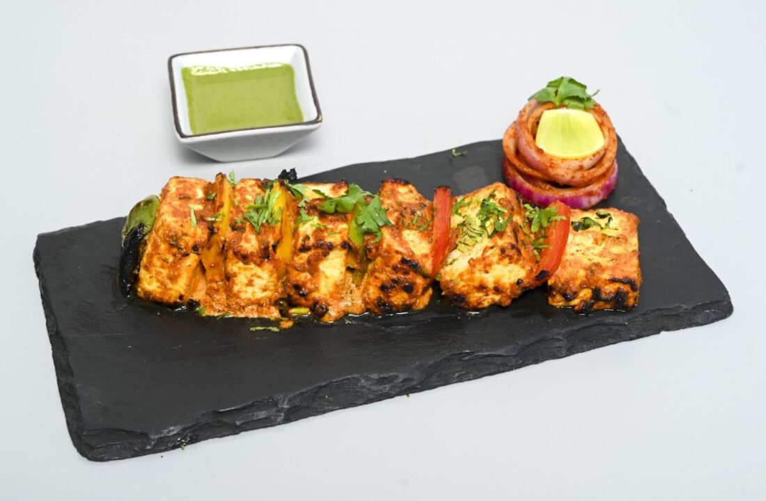 Paneer tikka on slate at nouba jaipur