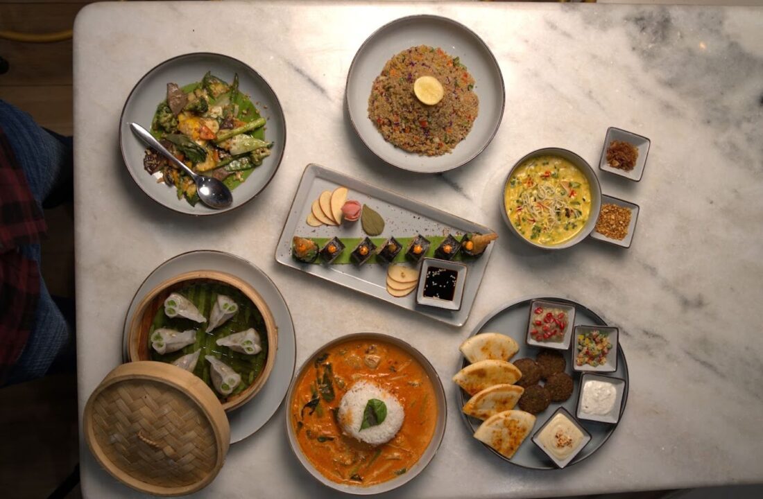 Overhead tasting spread on marble at nouba jaipur