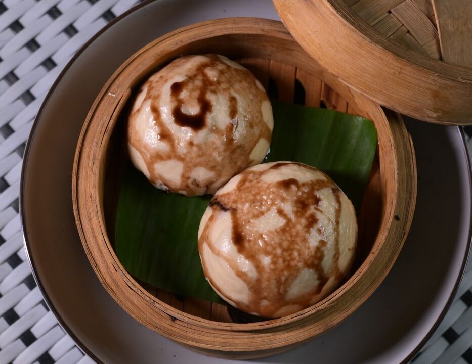 Dumplings in a bamboo steamer at nouba jaipur