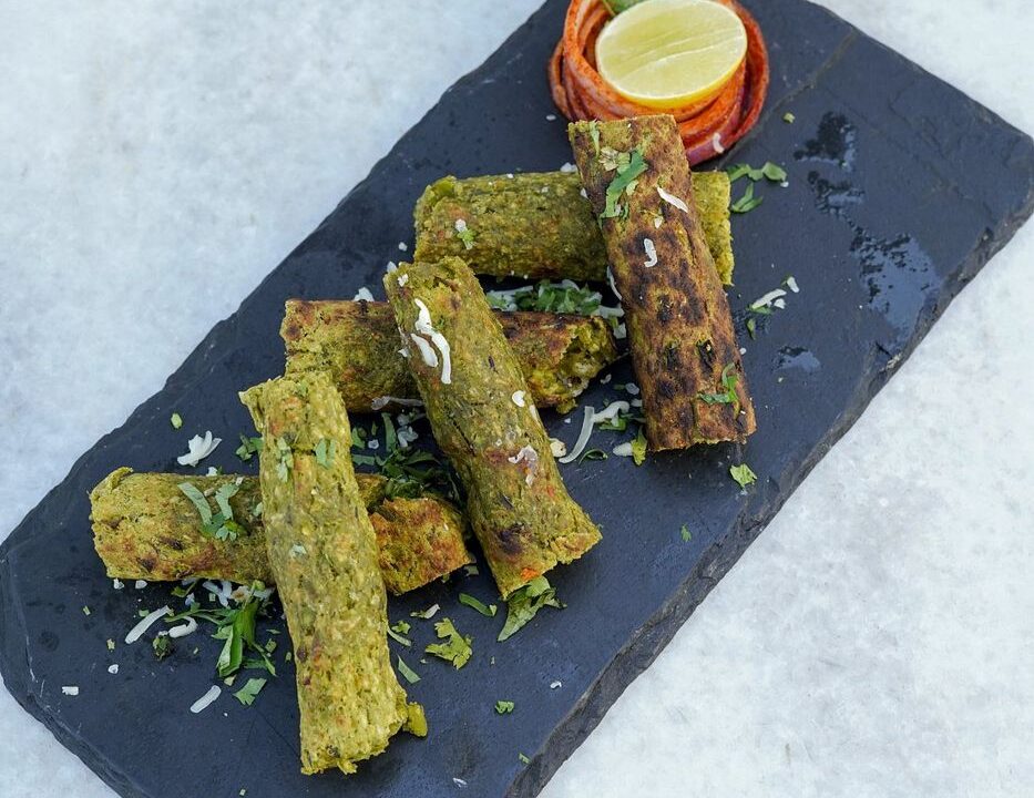 Stuffed kebab rolls on slate at nouba jaipur