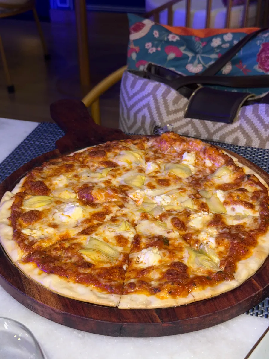 Artichoke and goat cheese pizza, vegetarian, at Nouba Jaipur